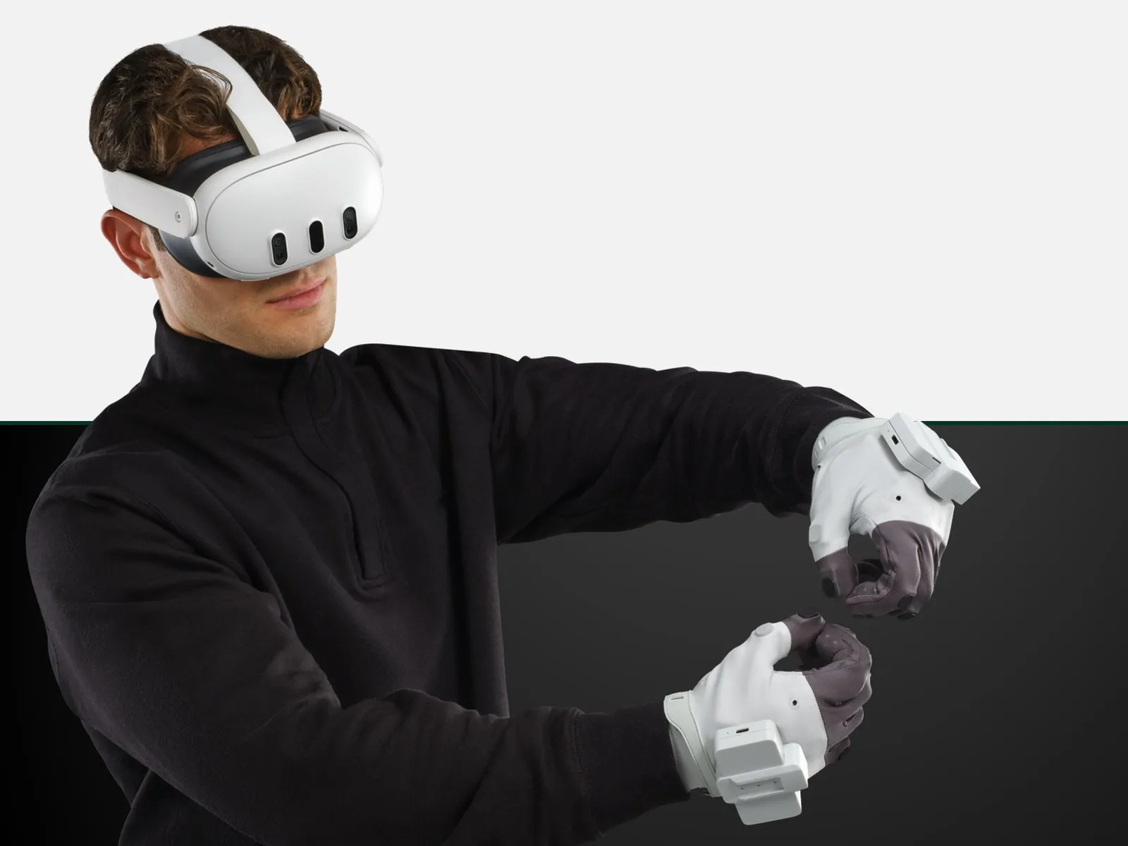 An operator wearing an XR headset and MANUS data gloves, pinching with both hands