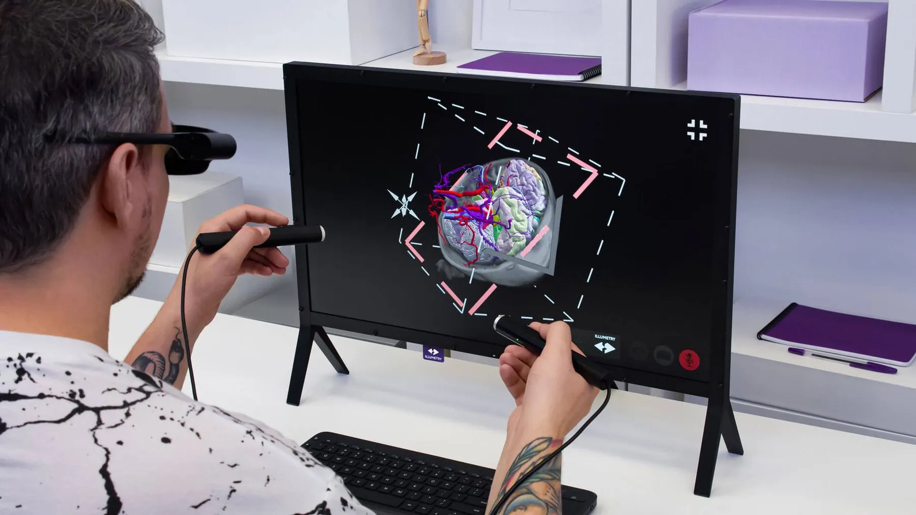 A user pulling a 3D model out of the ILLUMETRY IO screen with the stylus